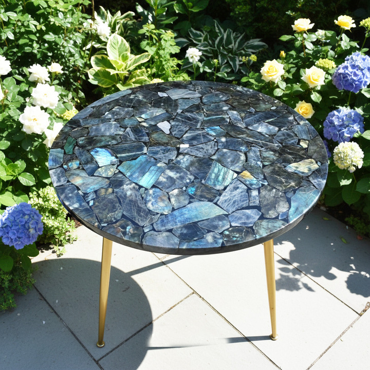 Round labradorite side table made from natural gemstone with polished crystal surface and luxury decorative base