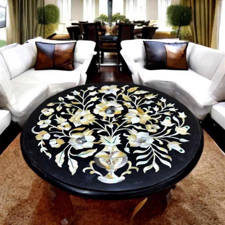 Round black marble Pietradura table with handmade floral art and mother of pearl inlay