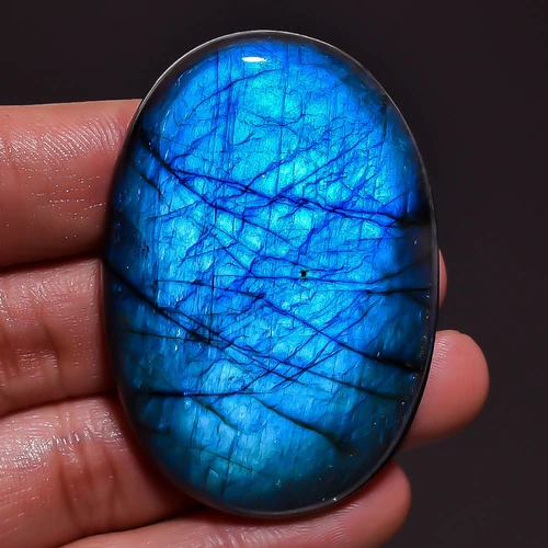 Handmade labradorite coffee table with iridescent blue stone top